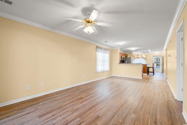 820 Fairway Dr Unit 1506Hh, Longs, SC 29568 - unfurnished living room featuring crown molding, light wood-type flooring, a chandelier, baseboards, and a textured ceiling