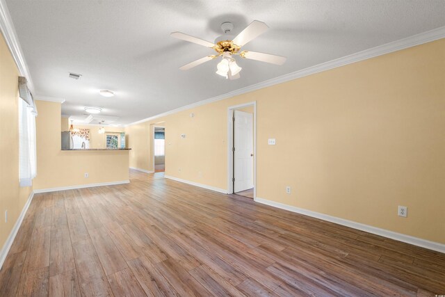 820 Fairway Dr Unit 1506Hh, Longs, SC 29568 - unfurnished living room with ornamental molding, wood finished floors, a ceiling fan, and baseboards