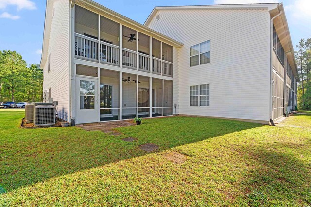 820 Fairway Dr Unit 1506Hh, Longs, SC 29568 - rear view of property featuring ceiling fan, a sunroom, cooling unit, and a yard