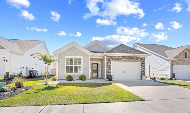 view of front of home featuring driveway, an attached garage, a front lawn, stone siding, and board and batten siding