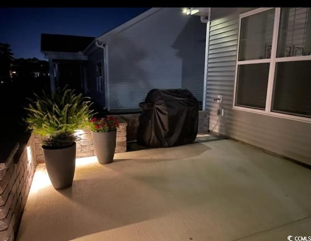view of patio at twilight