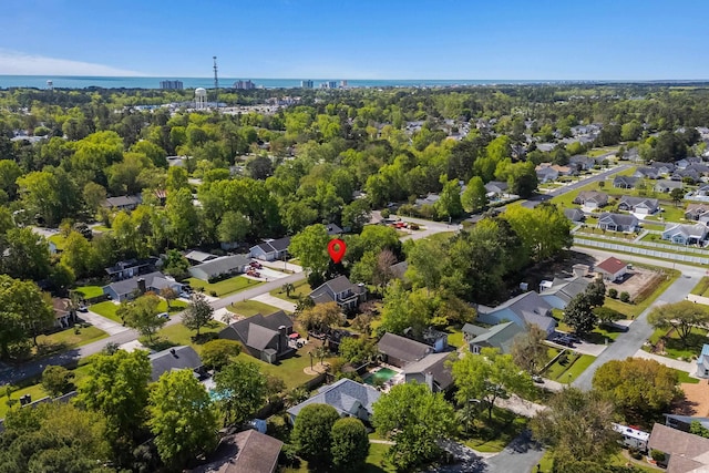 birds eye view of property featuring a residential view and a water view