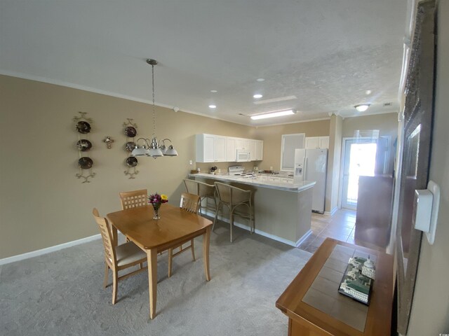 901-9 W Port Dr Unit 907, North Myrtle Beach, SC 29582 - dining room with ornamental molding, baseboards, recessed lighting, and light colored carpet