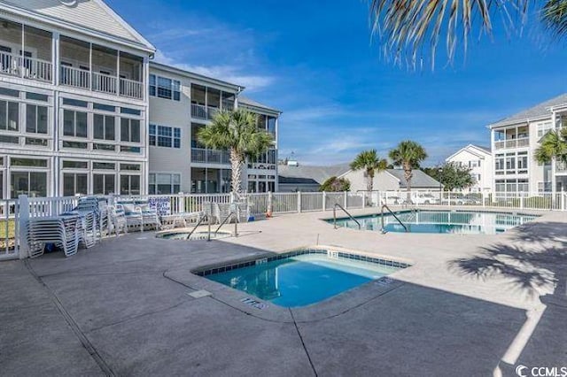 901-9 W Port Dr Unit 907, North Myrtle Beach, SC 29582 - community pool featuring a patio area