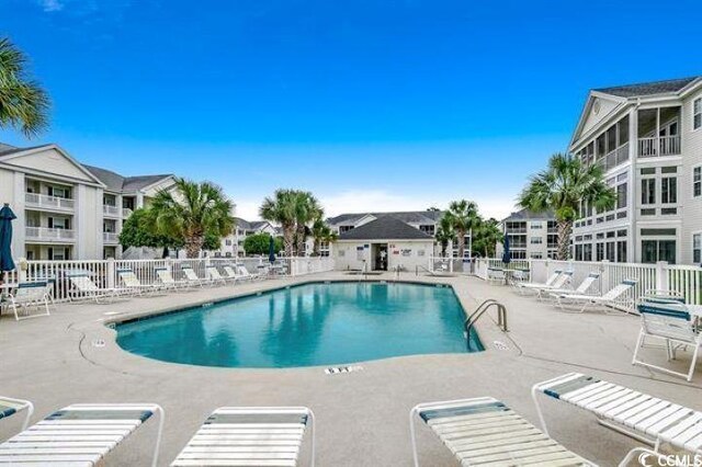 901-9 W Port Dr Unit 907, North Myrtle Beach, SC 29582 - community pool featuring a patio area