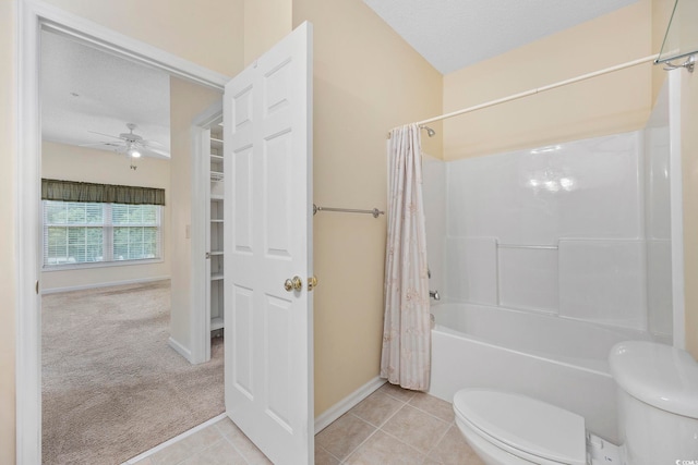 full bath featuring ceiling fan, toilet, shower / tub combo with curtain, tile patterned floors, and baseboards