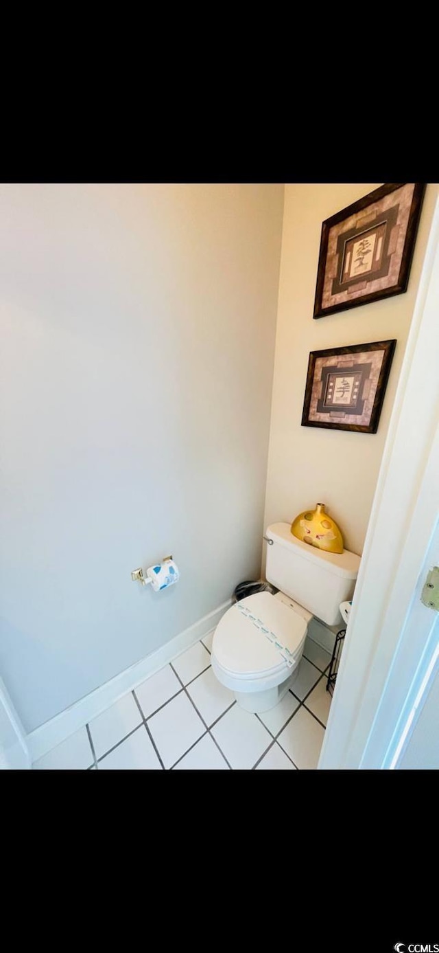 4669 Wild Iris Dr Unit 22-2O2, Myrtle Beach, SC 29577 - bathroom featuring toilet, tile patterned flooring, and baseboards