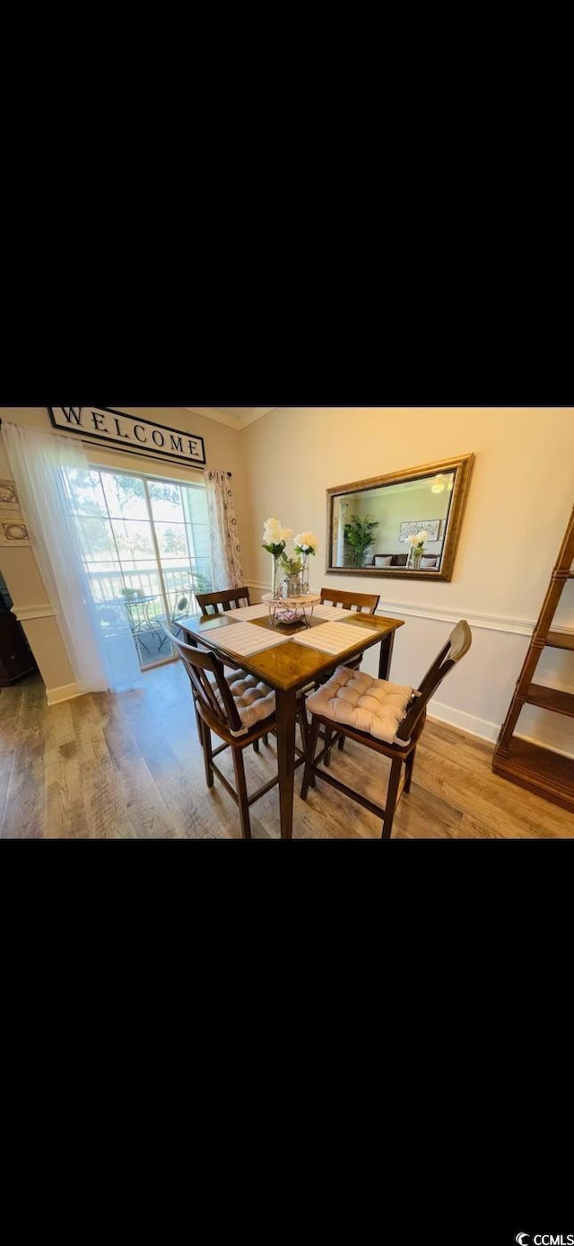 4669 Wild Iris Dr Unit 22-2O2, Myrtle Beach, SC 29577 - dining area with light wood finished floors