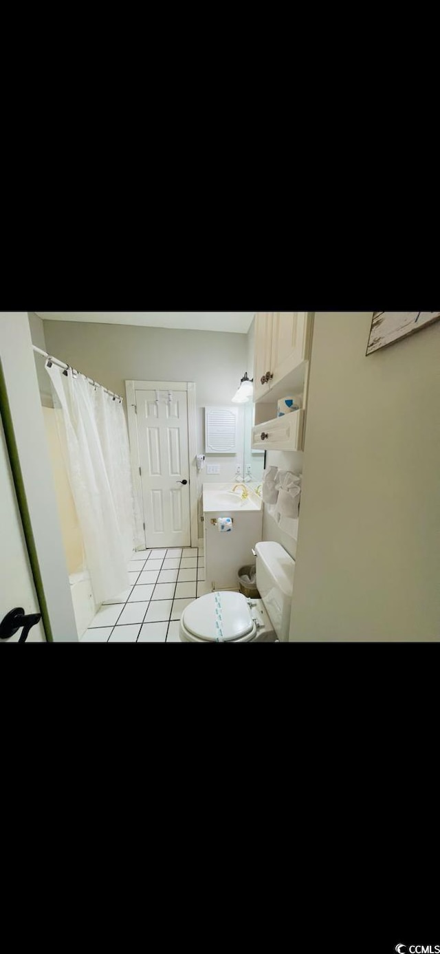 4669 Wild Iris Dr Unit 22-2O2, Myrtle Beach, SC 29577 - full bath with a shower with shower curtain and tile patterned flooring