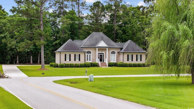 4100 Hagwood Cir, Conway, SC 29526 - view of front of house featuring a front yard and view of wooded area