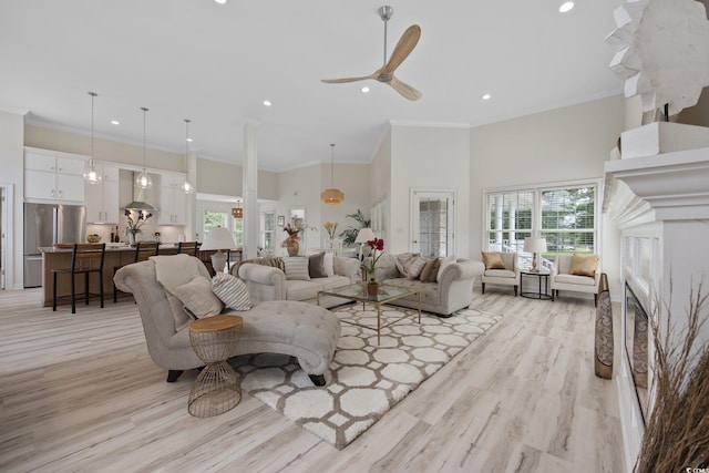 4100 Hagwood Cir, Conway, SC 29526 - living area with plenty of natural light, a towering ceiling, recessed lighting, light wood-style flooring, and ceiling fan