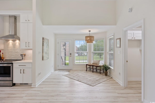 4100 Hagwood Cir, Conway, SC 29526 - foyer entrance featuring light wood-style floors, baseboards, and a high ceiling