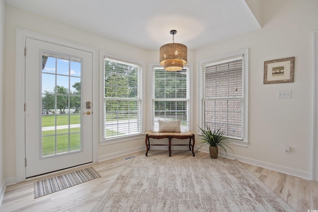 4100 Hagwood Cir, Conway, SC 29526 - doorway with baseboards and wood finished floors
