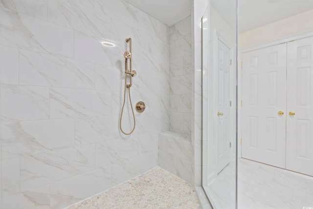 4100 Hagwood Cir, Conway, SC 29526 - bathroom featuring tiled shower and a closet