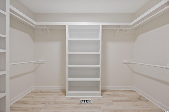4100 Hagwood Cir, Conway, SC 29526 - walk in closet with wood finished floors