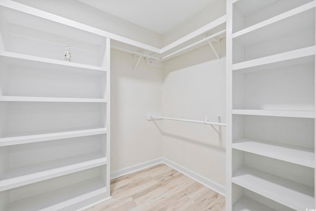 4100 Hagwood Cir, Conway, SC 29526 - walk in closet featuring wood finished floors