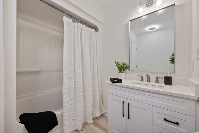 4100 Hagwood Cir, Conway, SC 29526 - full bathroom featuring vanity, shower / bath combo, and wood finished floors