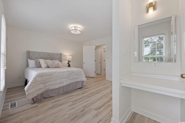 4100 Hagwood Cir, Conway, SC 29526 - bedroom with light wood-style flooring and baseboards