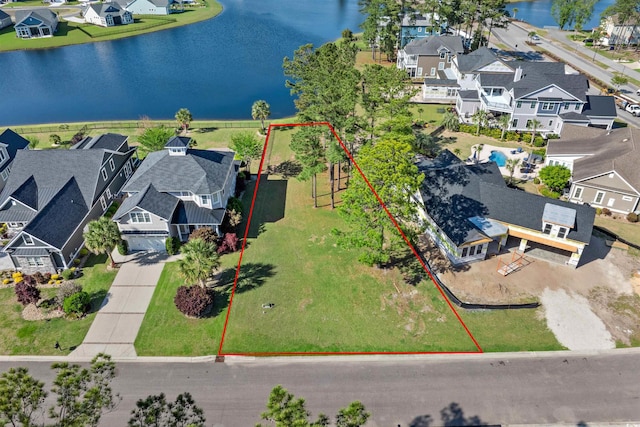 573 Starlit Way, Myrtle Beach, SC 29579 - aerial perspective of suburban area with property parcel outlined and a large body of water