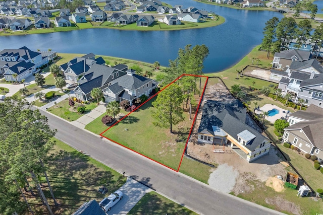 573 Starlit Way, Myrtle Beach, SC 29579 - aerial view of residential area with property parcel outlined and a large body of water