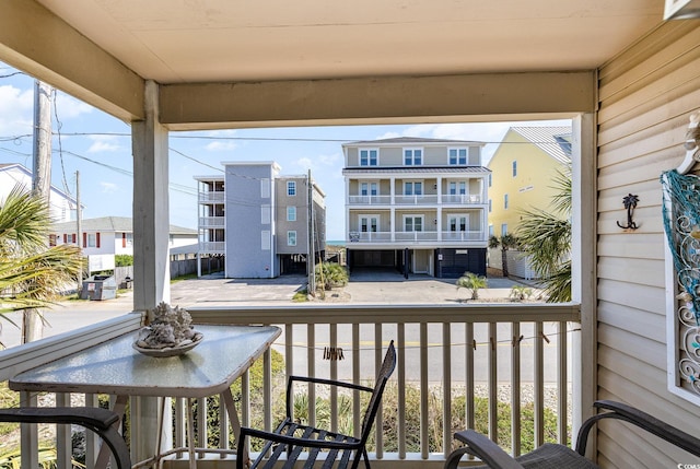 balcony featuring a residential view