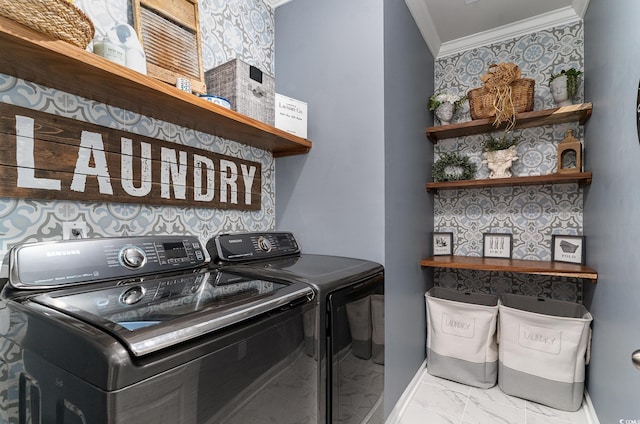 laundry area featuring marble finish floor, laundry area, ornamental molding, washing machine and dryer, and baseboards