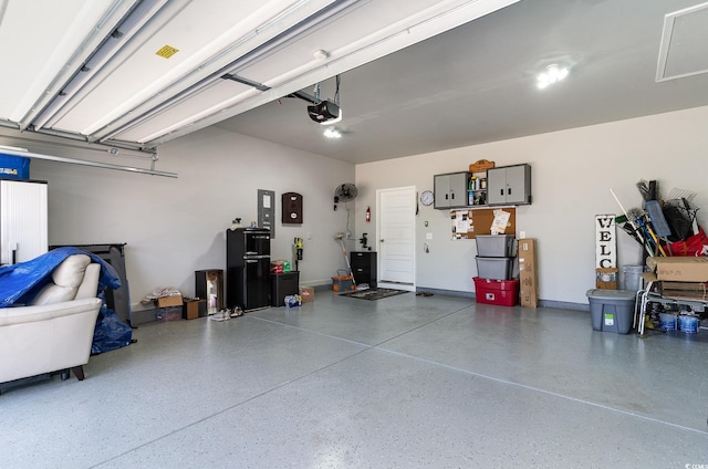 garage featuring a garage door opener