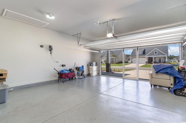 garage featuring a garage door opener