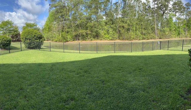 view of yard with a fenced backyard