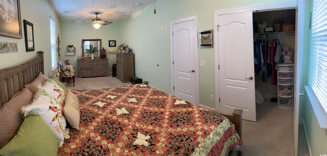 carpeted bedroom featuring a closet