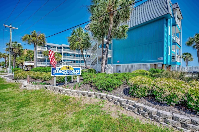 720 N Waccamaw Dr Unit 207, Garden City Beach, SC 29576 - exterior space featuring a lawn