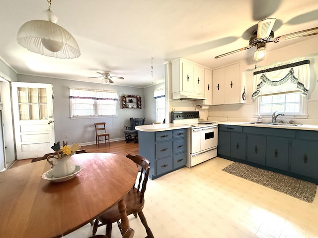 kitchen with a sink, ceiling fan, white electric range, and under cabinet range hood