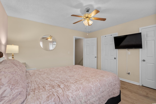 707 S 26th Ave S Unit L, North Myrtle Beach, SC 29582 - bedroom featuring wood finished floors, baseboards, and ceiling fan