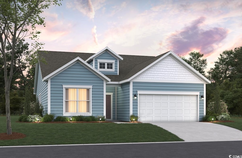 view of front of home with a garage, a front lawn, roof with shingles, and driveway