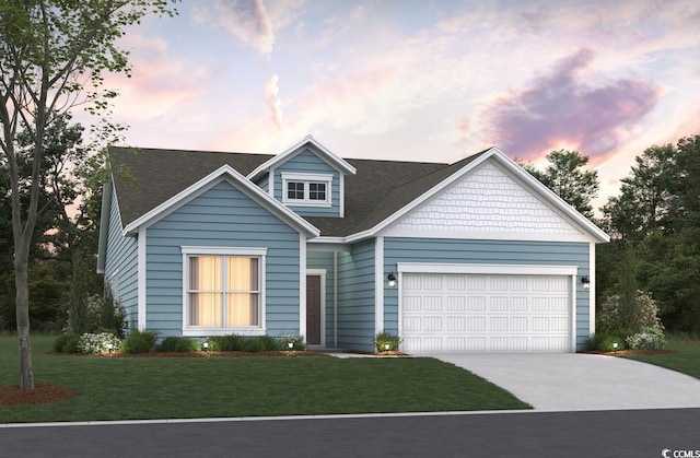 view of front of home with a garage, a front lawn, roof with shingles, and driveway