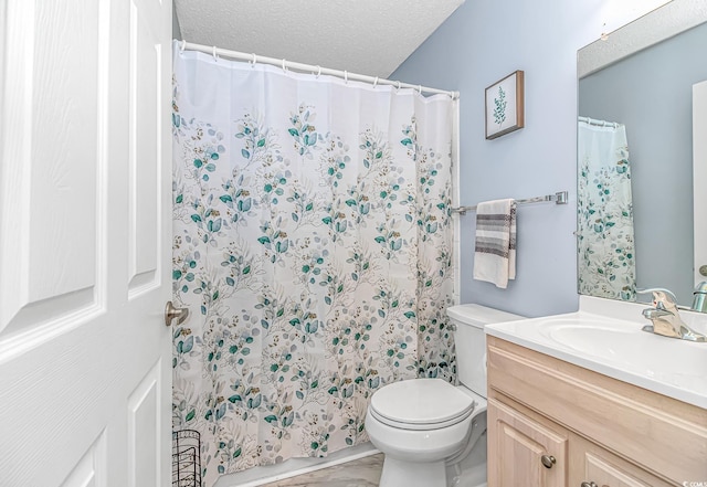 bathroom with vanity, a textured ceiling, a shower with curtain, and toilet
