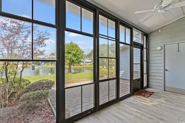 775 Plantation Dr Unit 87, Little River, SC 29566 - unfurnished sunroom featuring a water view, lofted ceiling, ceiling fan, and healthy amount of natural light