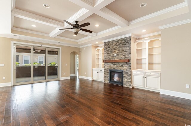 7041 Turtle Cove Dr, Myrtle Beach, SC 29579 - unfurnished living room featuring ceiling fan, arched walkways, wood-type flooring, beam ceiling, and ornamental molding