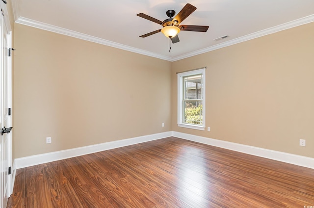 7041 Turtle Cove Dr, Myrtle Beach, SC 29579 - spare room with crown molding, dark wood finished floors, ceiling fan, and baseboards