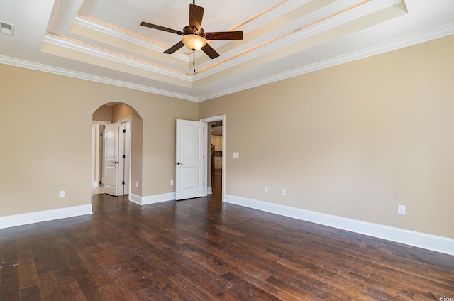 7041 Turtle Cove Dr, Myrtle Beach, SC 29579 - spare room featuring a raised ceiling, arched walkways, ornamental molding, a ceiling fan, and dark wood finished floors
