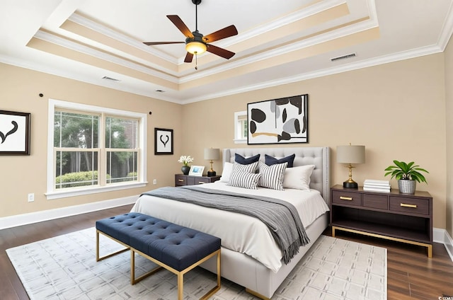 7041 Turtle Cove Dr, Myrtle Beach, SC 29579 - bedroom with a tray ceiling, wood finished floors, ornamental molding, baseboards, and a ceiling fan