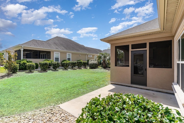 7041 Turtle Cove Dr, Myrtle Beach, SC 29579 - view of grassy yard with a sunroom