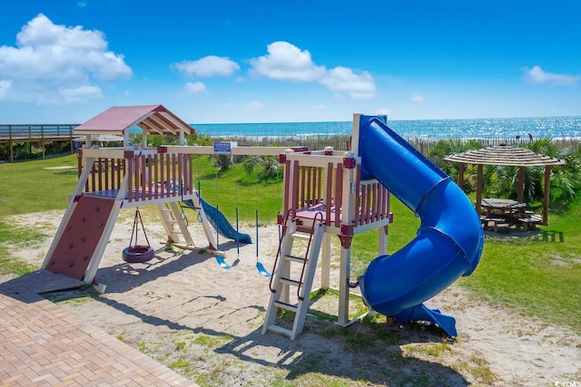 community play area with a water view and a yard