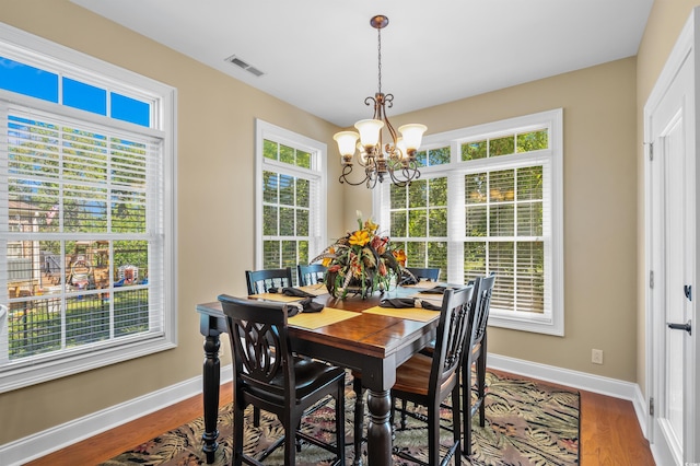 2213 Gazebo Ct, North Myrtle Beach, SC 29582 - dining area with a chandelier, plenty of natural light, and baseboards