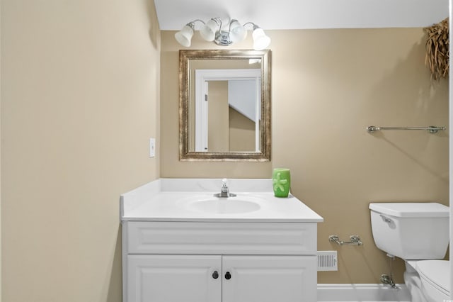 2213 Gazebo Ct, North Myrtle Beach, SC 29582 - half bath featuring toilet, vanity, and baseboards