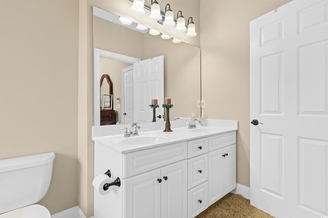 2213 Gazebo Ct, North Myrtle Beach, SC 29582 - bathroom with double vanity, toilet, and baseboards