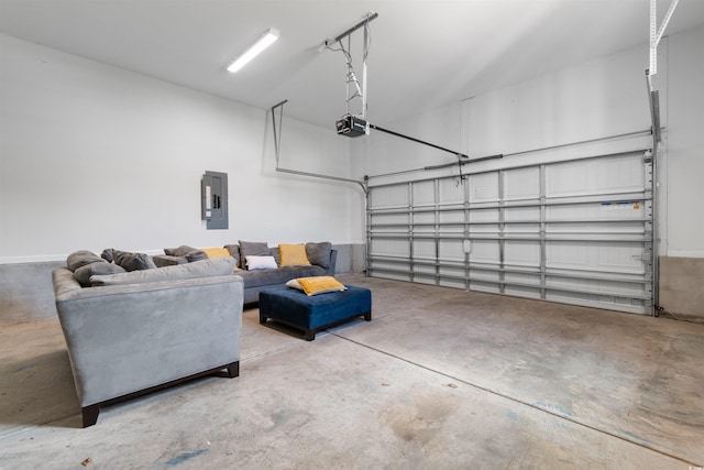 garage featuring electric panel and a garage door opener