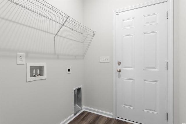 washroom with electric dryer hookup, washer hookup, baseboards, and dark wood-style flooring