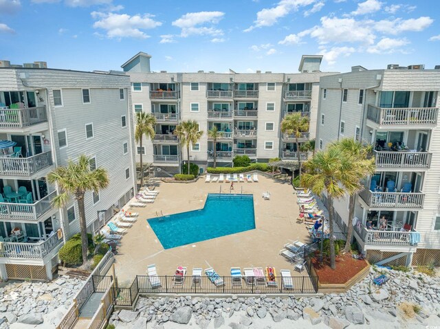 1310 N Waccamaw Dr Unit 211, Garden City Beach, SC 29576 - community pool featuring a patio