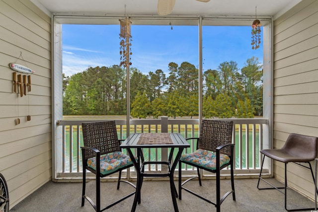 sunroom / solarium featuring a healthy amount of sunlight